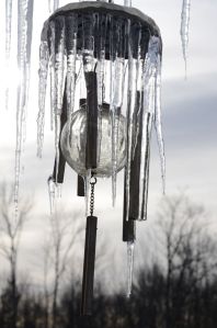 Frozen wind chimes on the porch