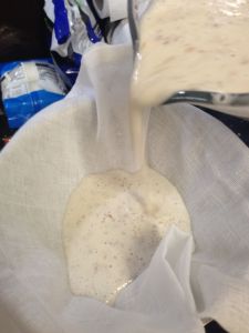 Strain through some muslin into a clean jar and squeeze all the liquid out